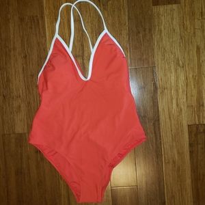 One piece swim suit with light lift.